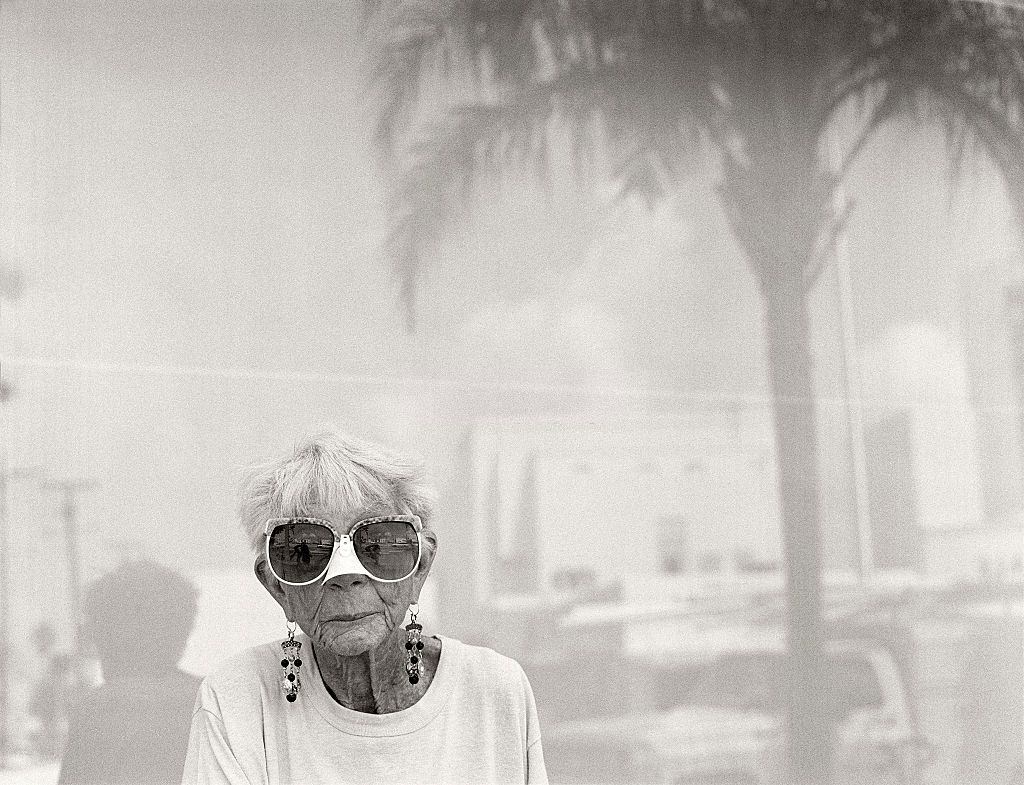 Woman with noseguard, Washington Avenue, Miami Beach, Florida.