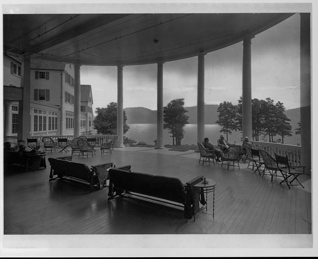 The wide, open porch of the Sagamore Hotel in Bolton Landing offers guests a panoramic view of Lake George and New York's Adirondack Mountains.