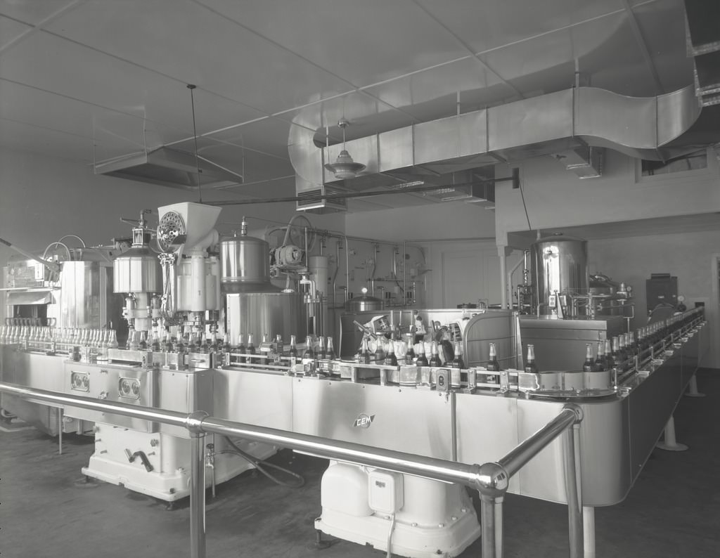 Barq's Root Beer Bottles on Bottling Machinery, Phoenix, 1940