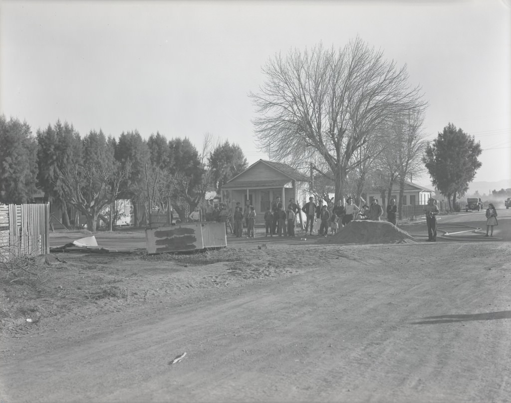 Firemen and Unidentified Persons in Residential Area, Phoenix, 1940