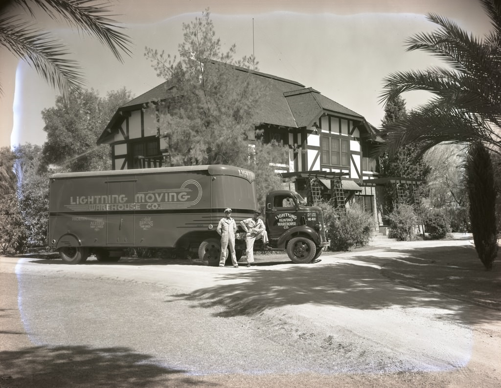 Lightning Moving Company Movers and Truck Moving Furniture into Residence, Phoenix, 1940