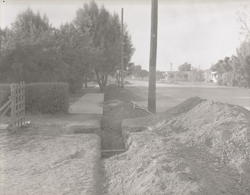 Ditch and Exposed Piping at the End of a Residential Property, Phoenix, 1940