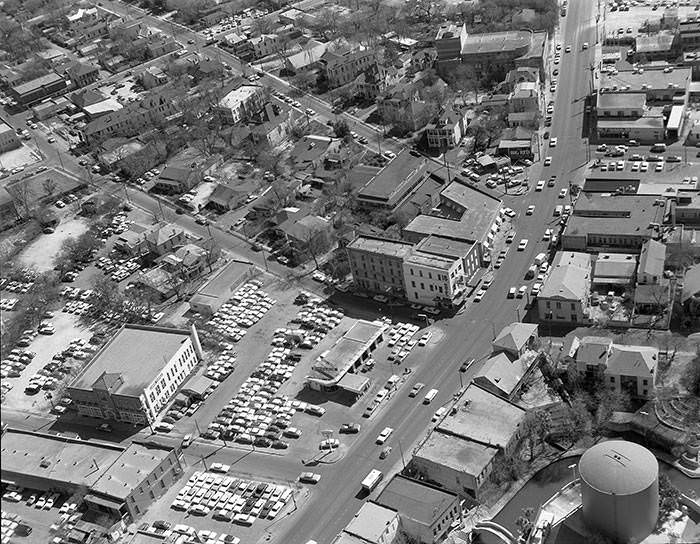 Aerial view looking south above the 200 and 300 blocks of South Alamo Street, 1965