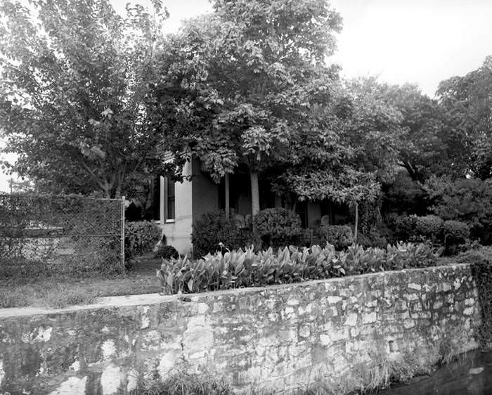 Front of small brick and tile house, 409 Camaron Street, San Antonio,1968
