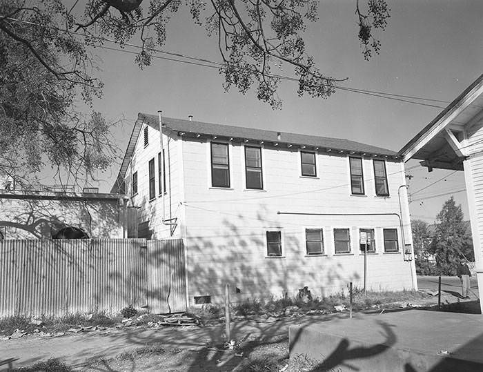 Warehouse and apartment behind Waitz Super Market, 548 Goliad Street at corner of Santa Clara Street, 1965