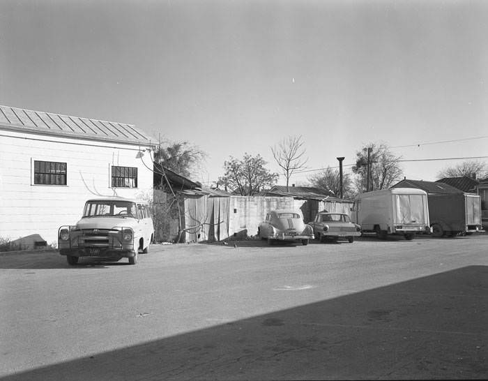 Parking lot in the 500 block of Goliad Street, 1966