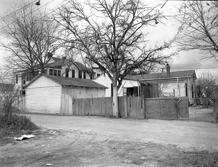 Shed and fence in the 200 block of Culberson Alley, 1965