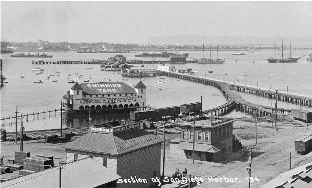 View of the piers and wharves of the San Diego Waterfront looking northwest toward Point Loma.