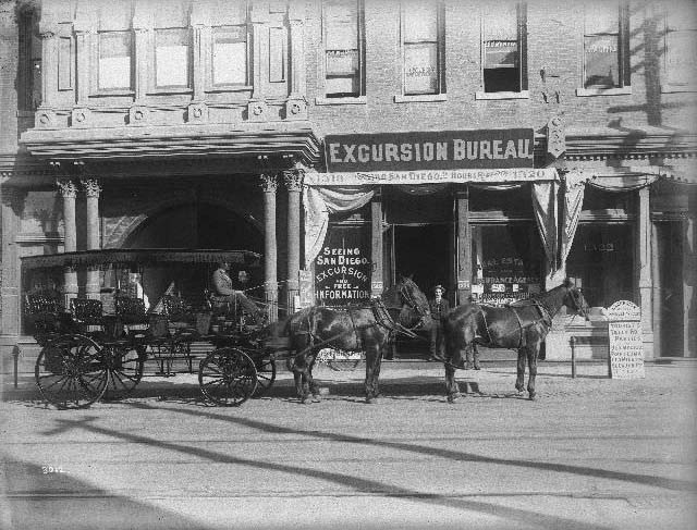 Horse-drawn coach in front of the San Diego Excursion Bureau, 1895