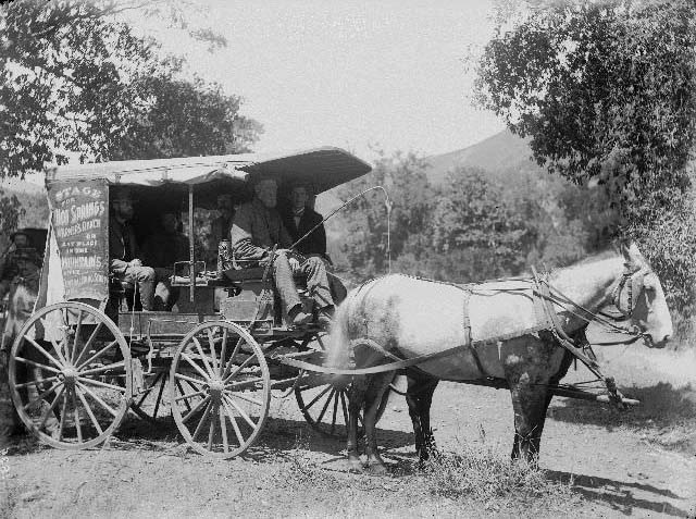 People riding in a Comstock's Stagecoach in the San Diego mountains, 1899