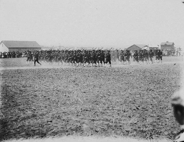 Japanese sailors from a training ship drilling onshore, 1899