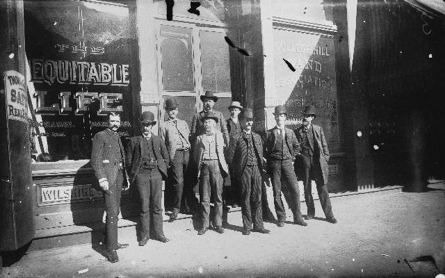 Employees of the Equitable Life Insurance Company standing outside their office at 1318 D Street, 1895