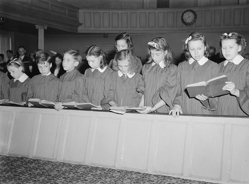 The vested choir singing at a Sunday morning service, 1942