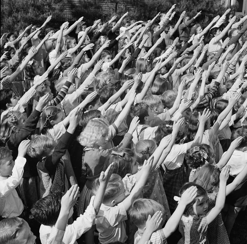 School children pledging their allegiance to the flag, 1942