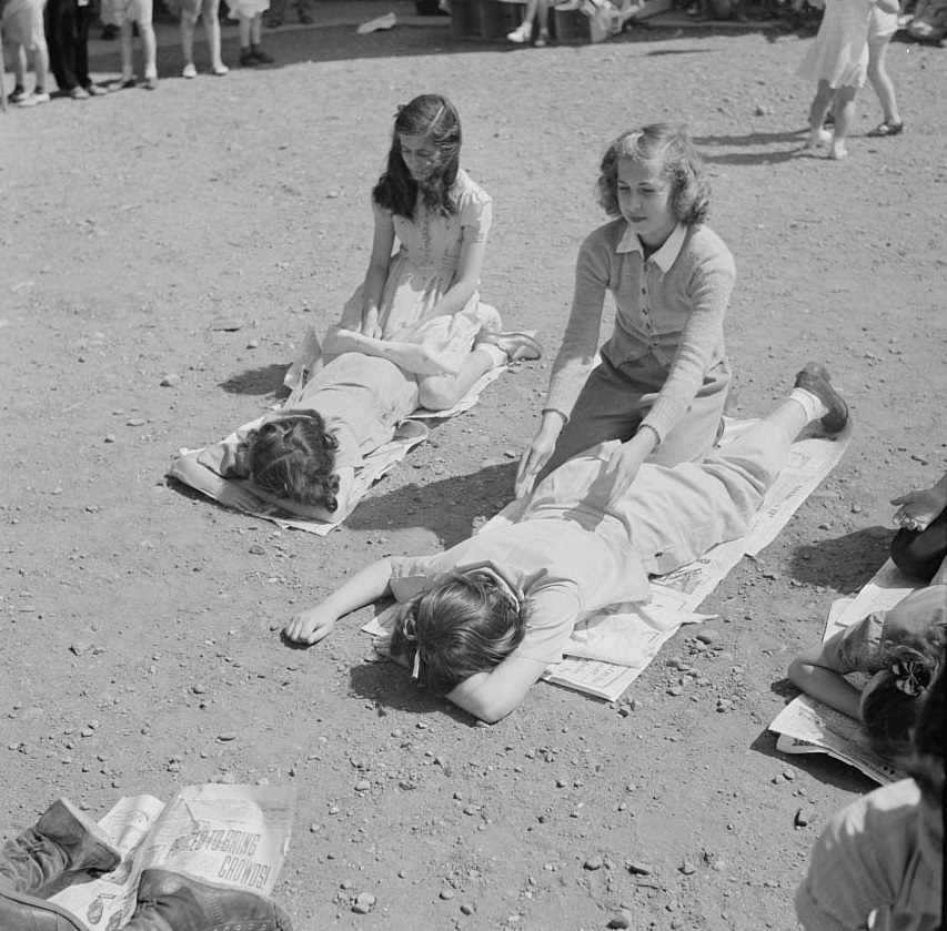 Students of first aid, practicing artificial respiration, 1942