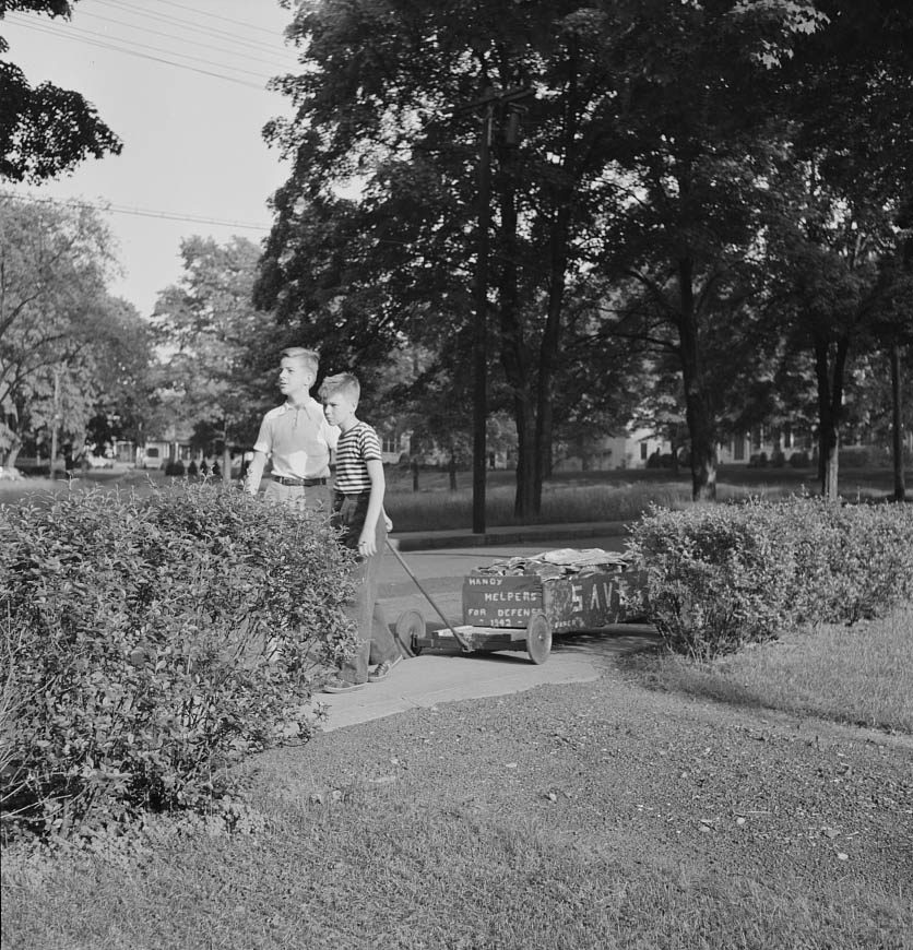 Boys collecting paper for war conversion, 1942