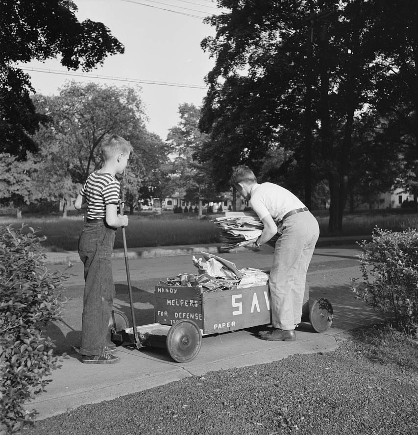 Boys collecting paper for war conversion, 1942