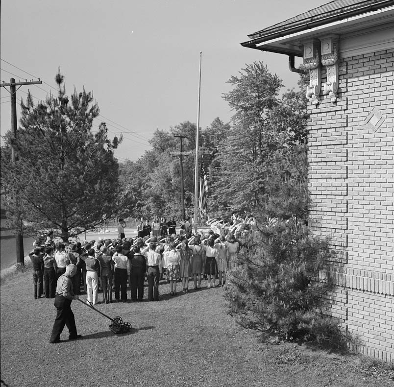 School children pledging their allegiance to the flag, 1942