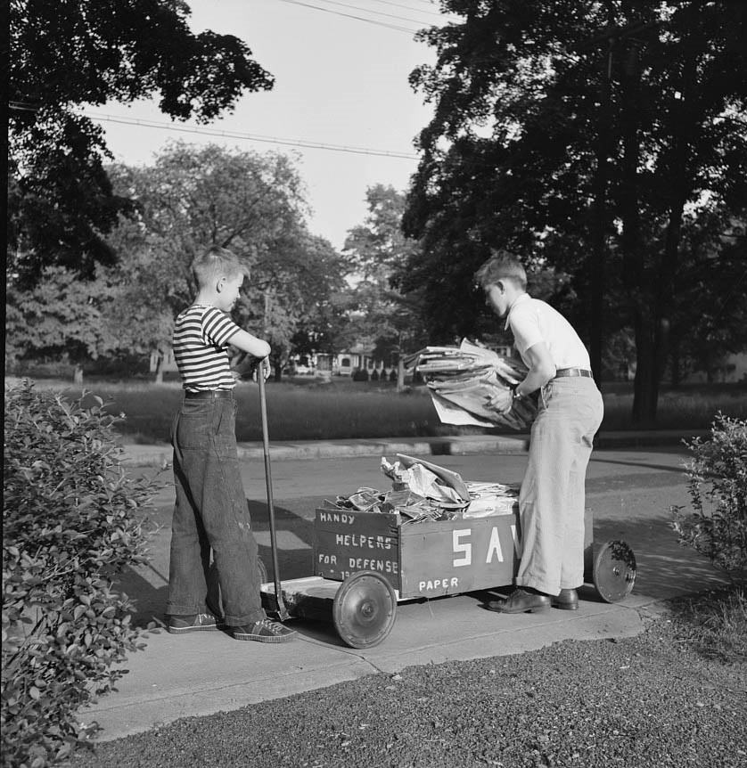 Boys collecting paper for war conversion, 1942