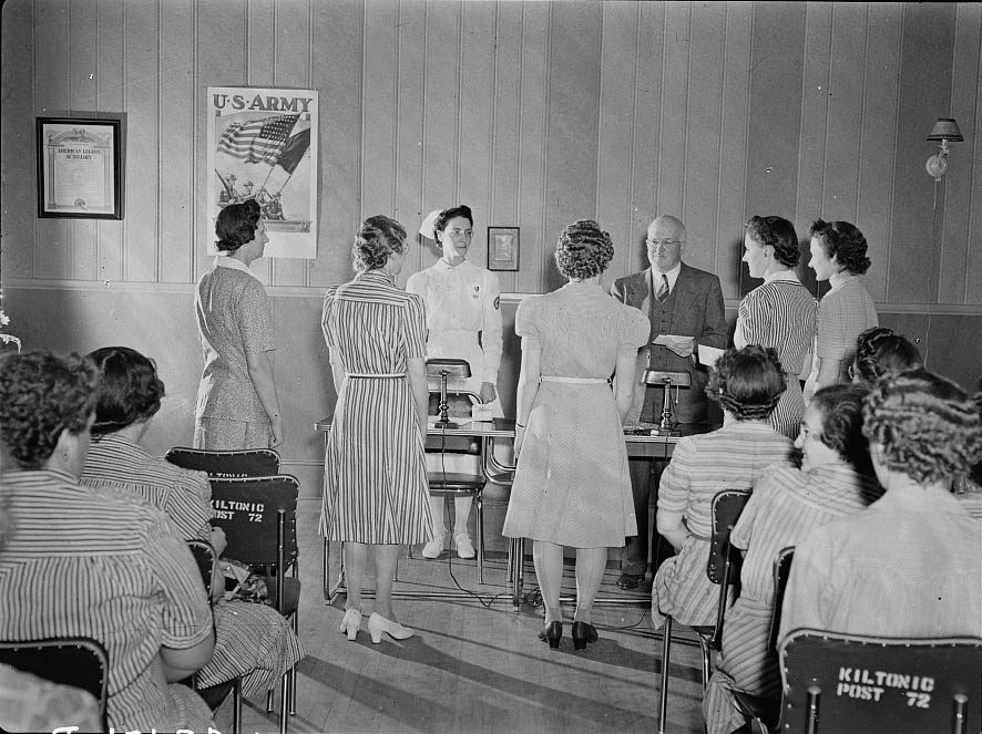 Graduates of a course in Red Cross nursing, receiving their certificates, 1942
