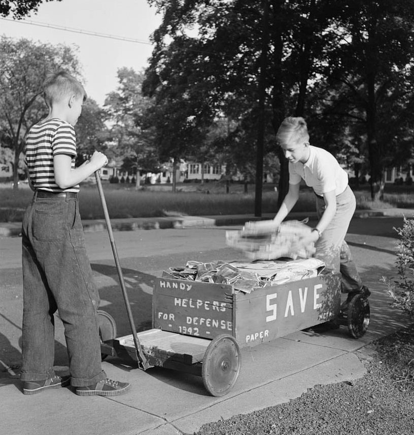 Boys collecting paper for war conversion, 1942