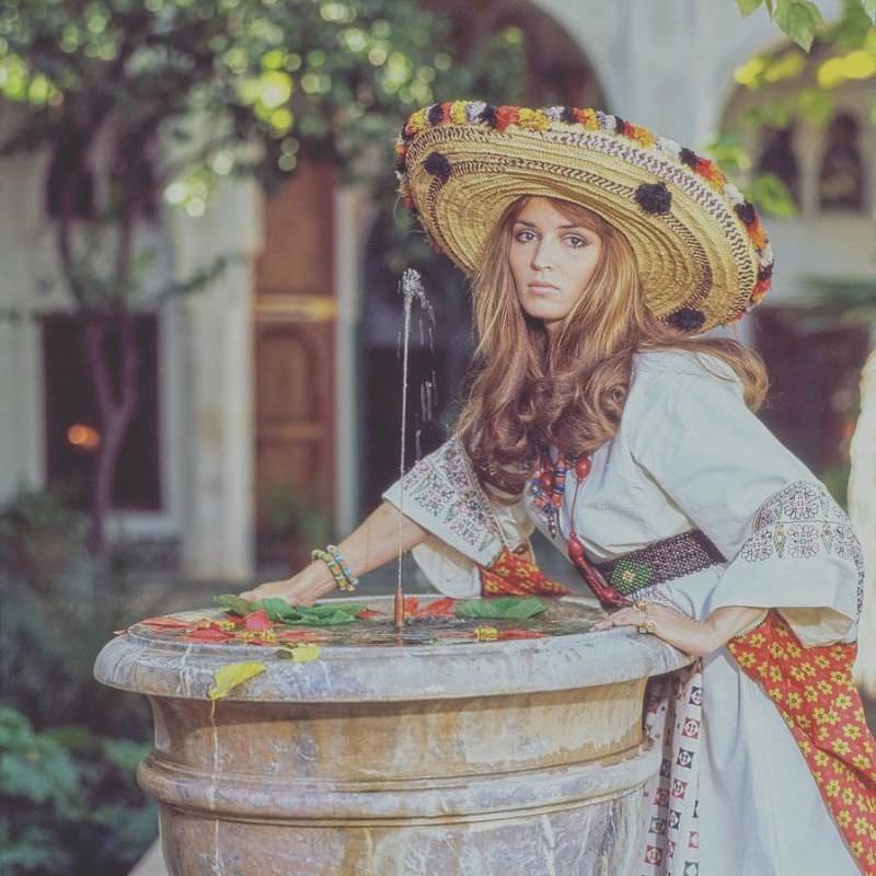 Talitha Getty by a fountain in her garden in Marrkesh, Morocco, January 15, 1970