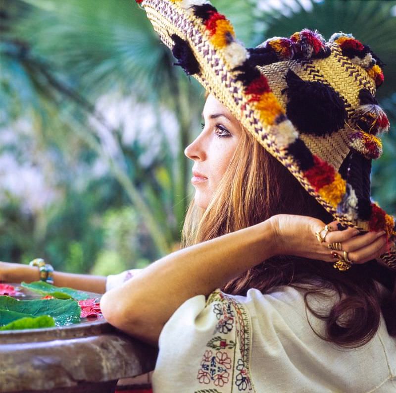 Talitha Getty wearing a sombrero in a garden in Marrakesh, Morocco, January 15, 1970