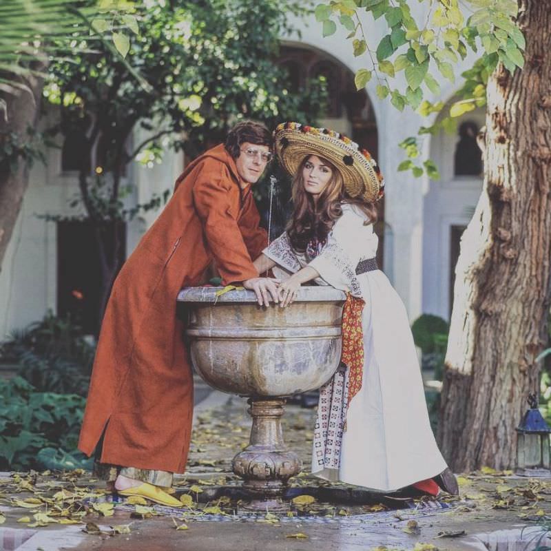 Paul and Talitha Getty leaning on a fountain in their garden in Marrakesh, Morocco, January 15, 1970