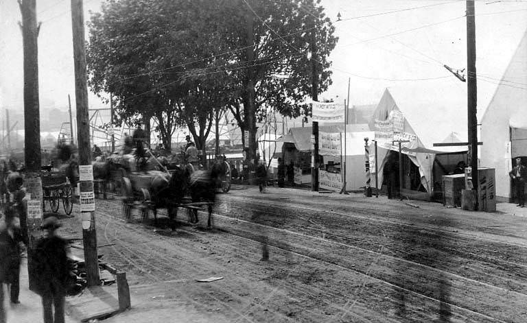 Temporary tent structures erected after the fire on the right, 1889