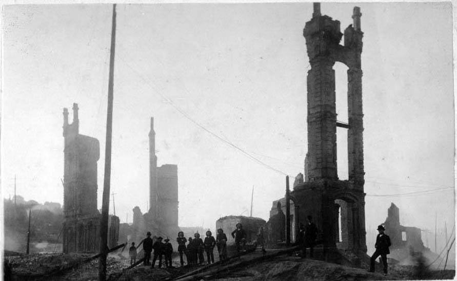 The firefighters standing in the ruins of the Occidental Hotel, 1889