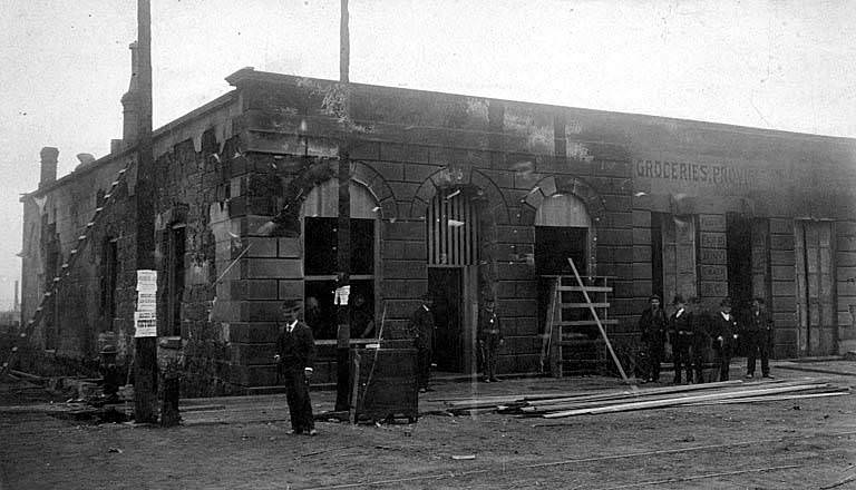 The ruins of the Dexter Horton and Co. bank at 1st Ave. S. and S. Washington Street, 1889