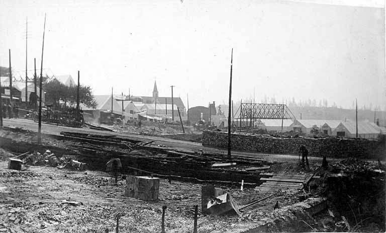 Looking past James St. showing tents along 2nd Ave. and Yesler Way, 1889