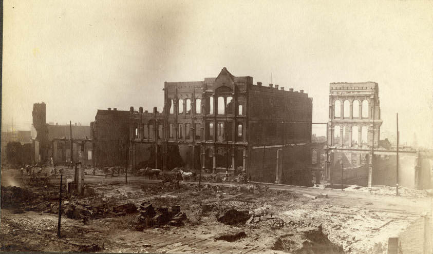 Fire ruins on west side of 1st Ave. between Columbia St. and Cherry St., June 1889
