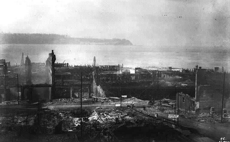 Aftermath of Seattle fire of June 6, 1889, 2nd Ave. and Columbia St., showing destroyed wharves.