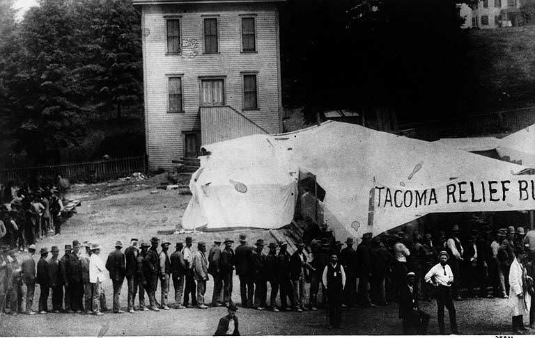 Bread line leading to tent of Tacoma Relief Bureau.1889