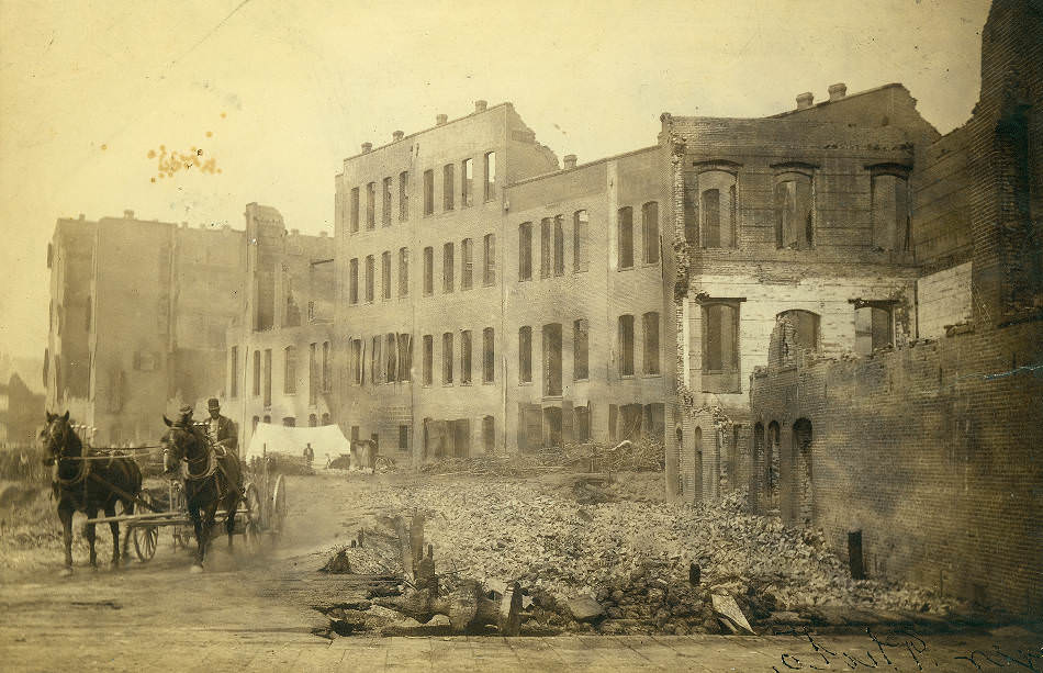 Showing the ruins of buildings along 1st Ave. from Columbia to Yesler, Seattle, Washington, 1889