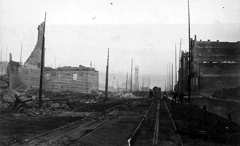 Looking south along cable car tracks on 1st Ave. from around Marion and Madison Streets, June 1889