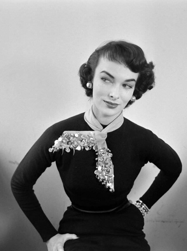 Victoria von Hagen shows how to accessorize a plain sweater, 1952