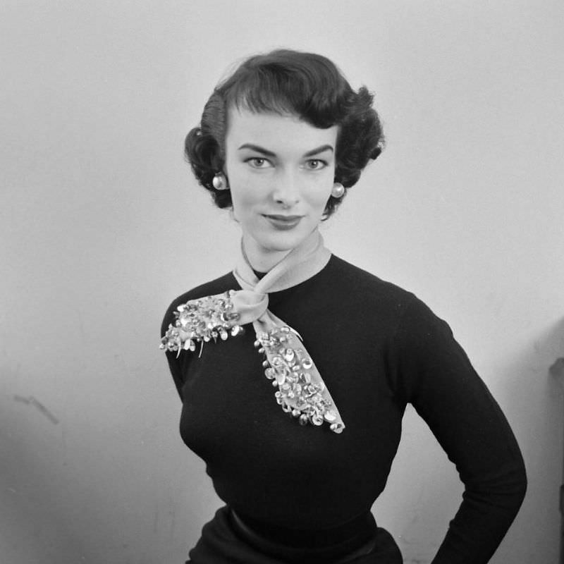 Victoria von Hagen shows how to accessorize a plain sweater, 1952