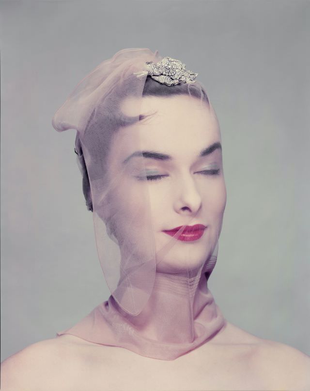 Victoria von Hagen wearing rose diamond brooch by Van Cleef & Arpels, Hudson nylons, April 1954