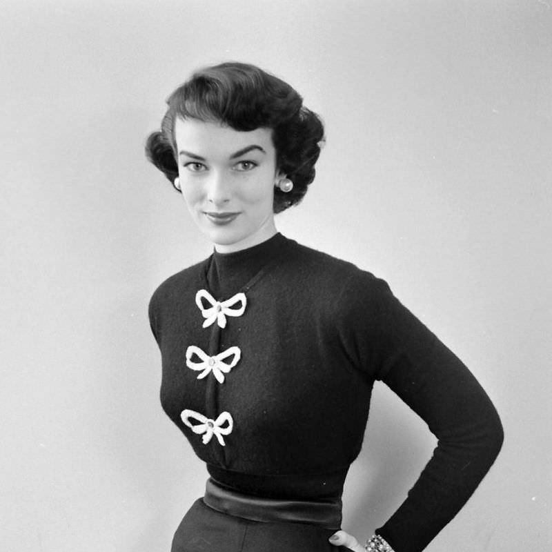 Victoria von Hagen in sweater adorned with bows, September 1952
