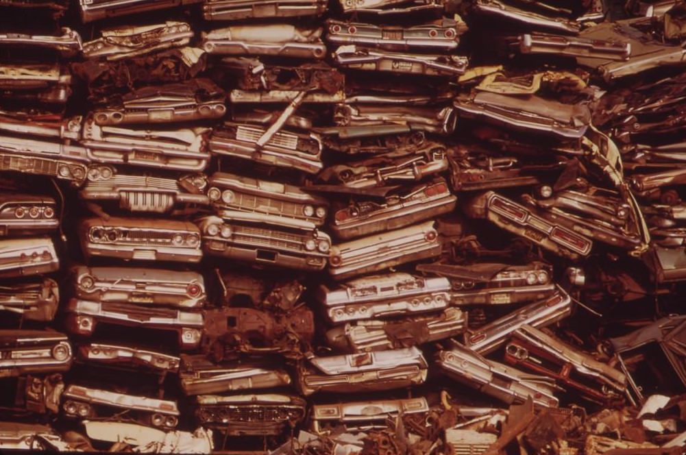 Stacked Cars In City Junkyard Will Be Used For Scrap, August 1973