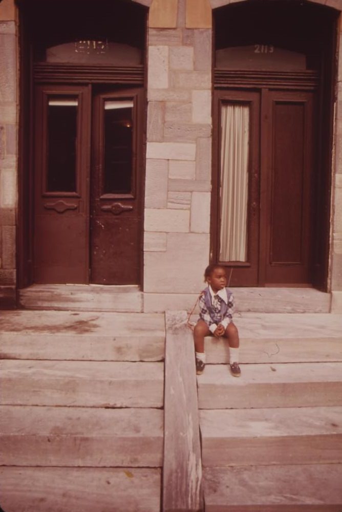 Child On Steps Of A North Philadelphia Row House, August 1973