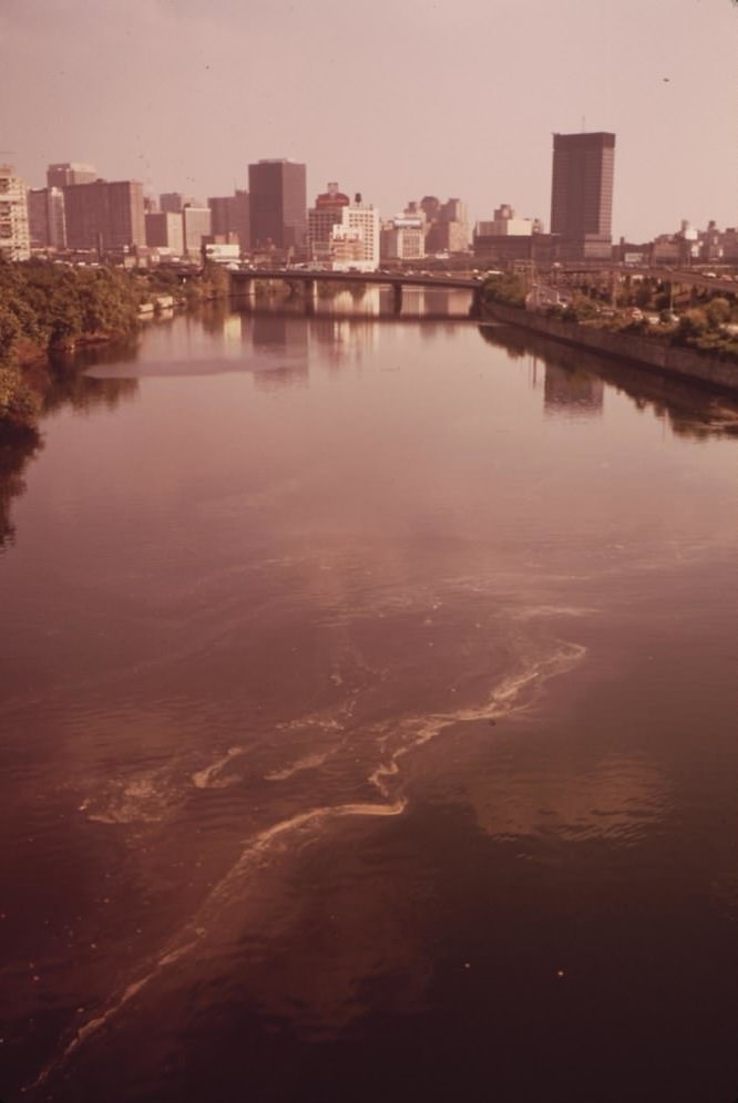 The Polluted Schuykill River And Center City In Background, August 1973