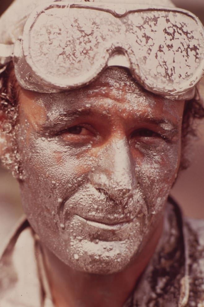 Painter Working On Chain Link Fence, August 1973