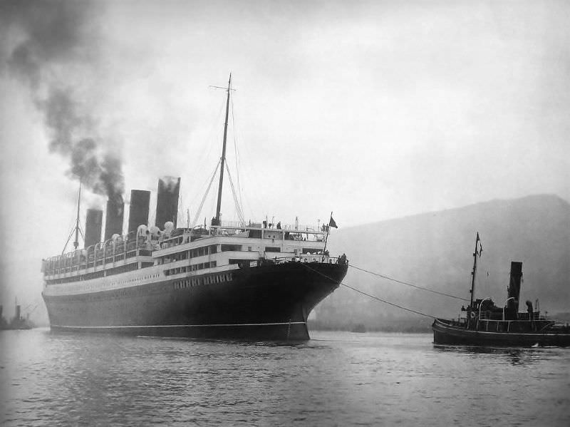Aquitania moves down the Clyde beginning her sea trials on 10 May 1914