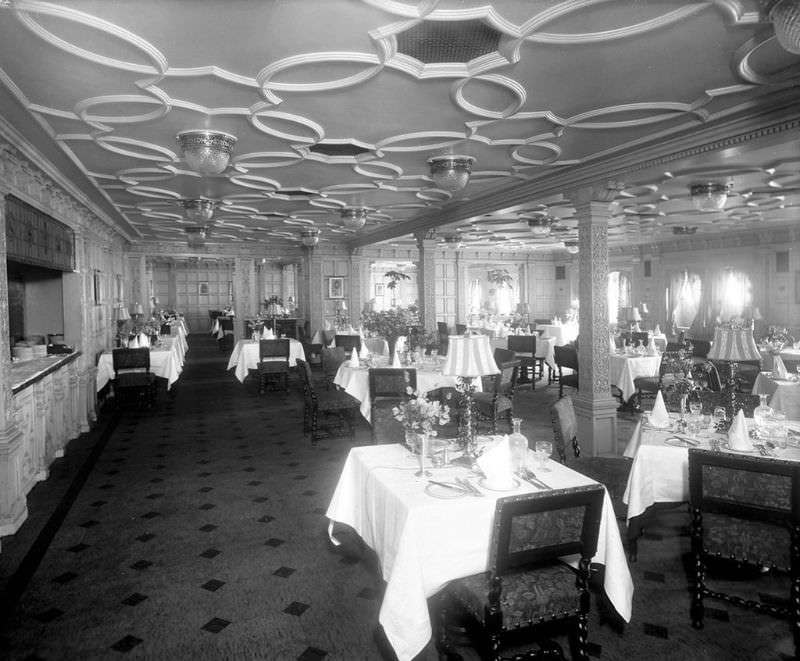 1st Class Grill Room aboard Aquitania. A view of the forward section of the extra tariff Grill Room, located on the port side of the Upper Deck (D Deck), May 1914