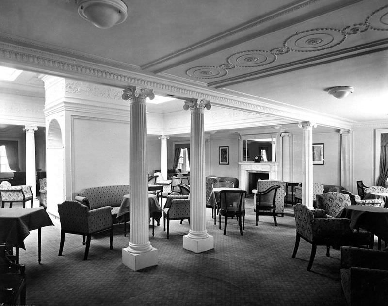 View of Aquitania's 2nd Class Drawing Room, on the Bridge Deck (B Deck); a view from the starboard side, looking towards the fireplace at the forward end, May 1914