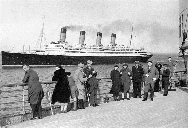 Aquitania, photographed from North German Lloyd's Europa as both liners depart New York in April 1939