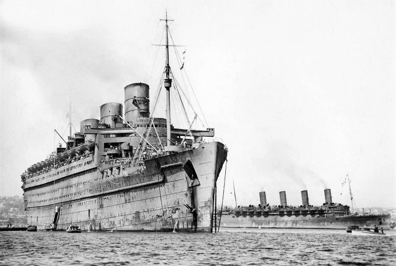 Troop-carrying Cunarders Queen Mary and Aquitania at Sydney in 1943